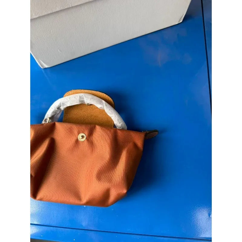 Mini sac à boulettes style Y2K, sac à bandoulière en nylon étanche, sac pour téléphone portable, sac à la mode pour femmes