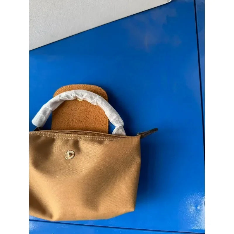 Mini sac à boulettes style Y2K, sac à bandoulière en nylon étanche, sac pour téléphone portable, sac à la mode pour femmes